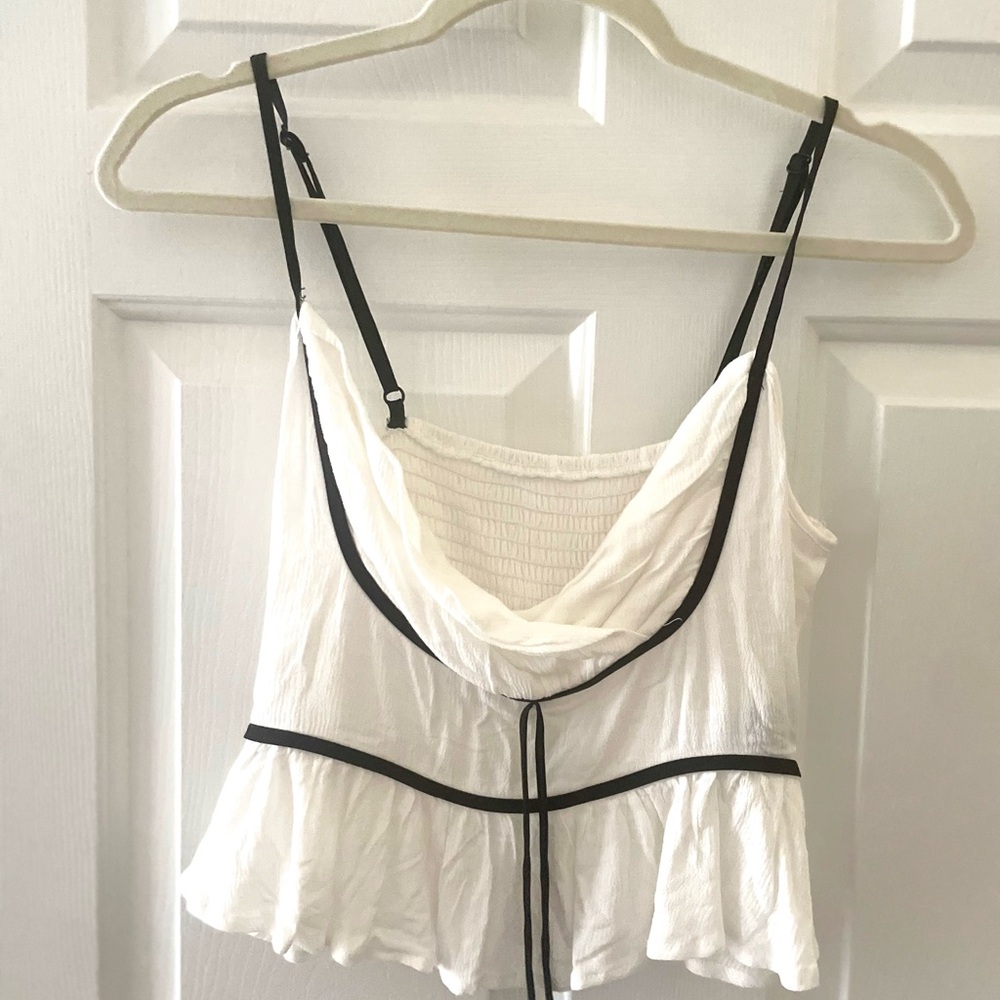 White Sleeveless Top with Black Trim